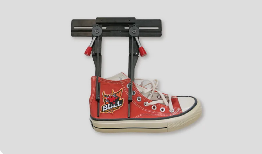 Sinsim multi-function clamp holding a canvas shoe